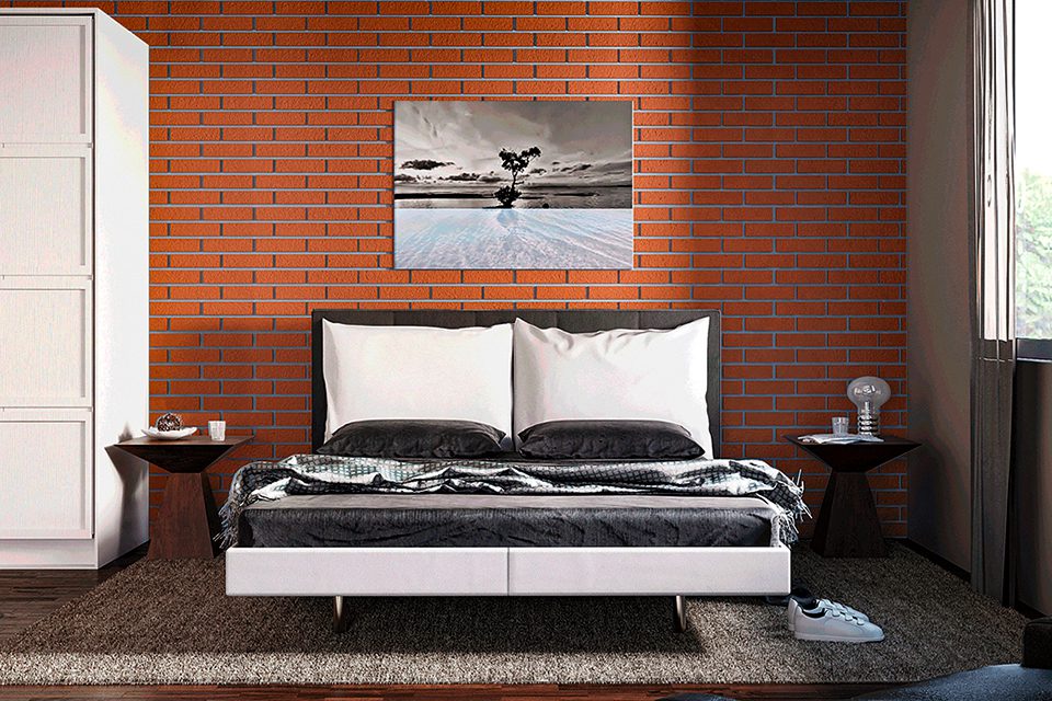 fachaladrillo utilizado para decorar una pared en una recamara en interior departamento moderno